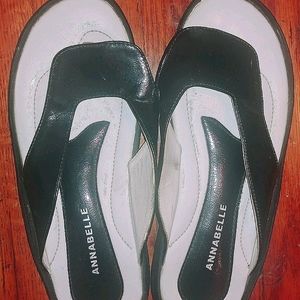Annabelle black patent leather flip flops